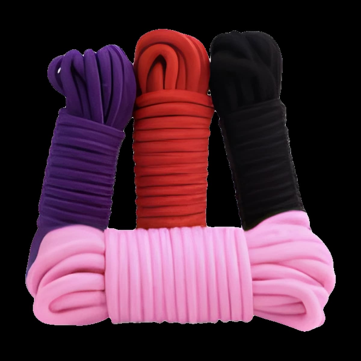 Three neatly coiled hanks of rope in purple, red and black standing upright behind a pink coil lying flat in front.