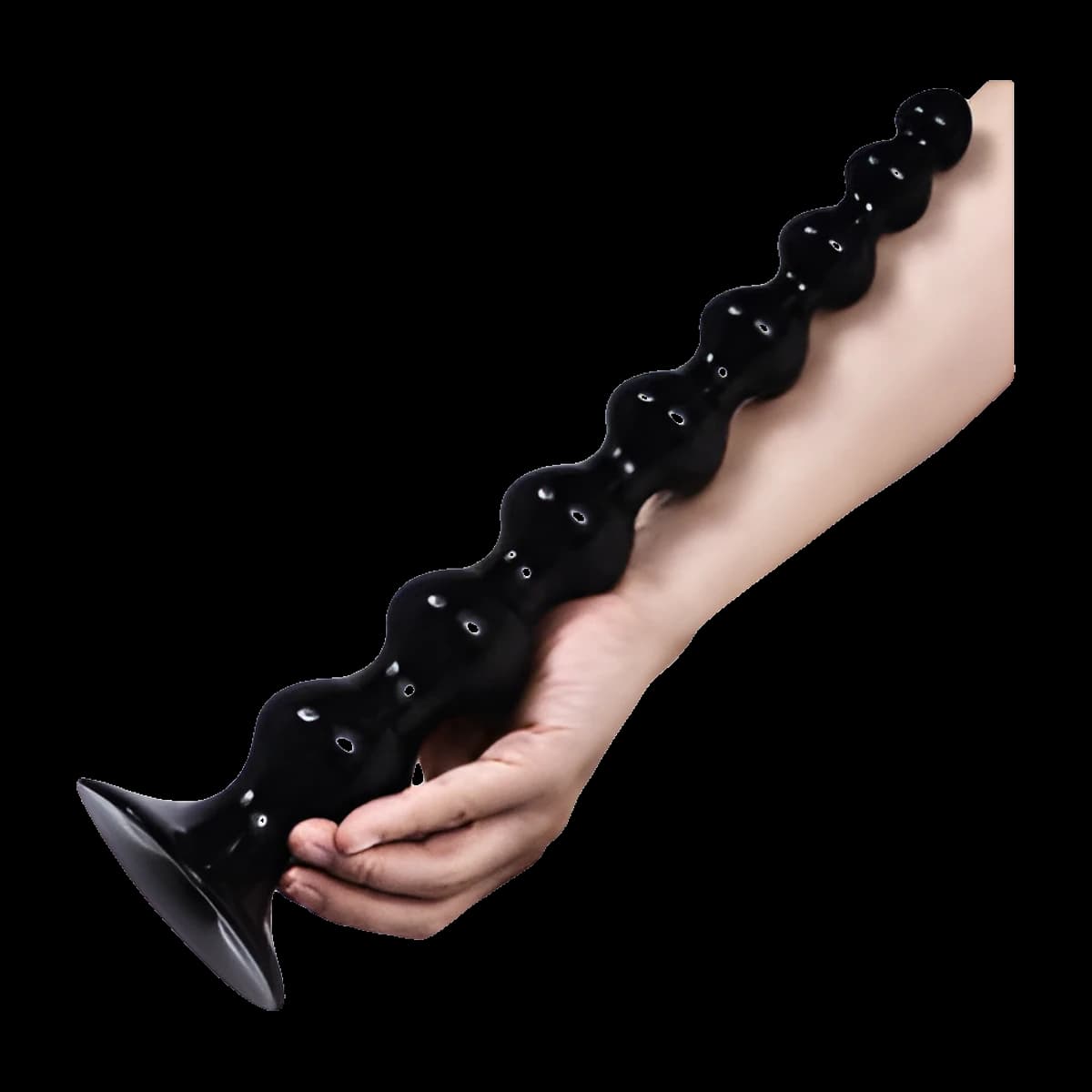 A hand holding a tall glossy black stick of stacked round beads that grow larger towards a wide suction cup base.