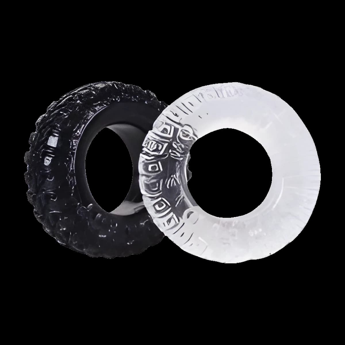 Two thick rings with a chunky tread pattern, one black and one clear, standing upright and overlapping slightly.